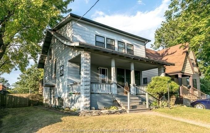 Detached home with a covered front porch at 328 John B Avenue